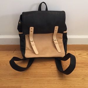 Coop double buckle flap backpack