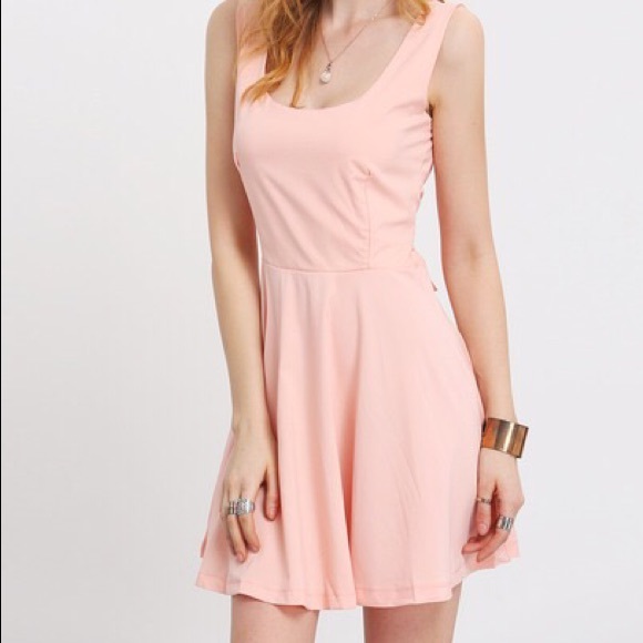 Pink skater dress with bow back