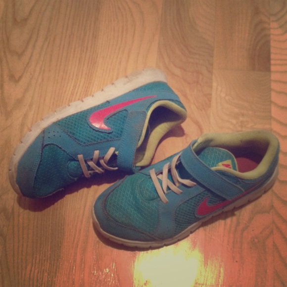 Aqua Nike tennis shoes.