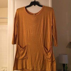 Gold tunic shirt with accent buttons, size L