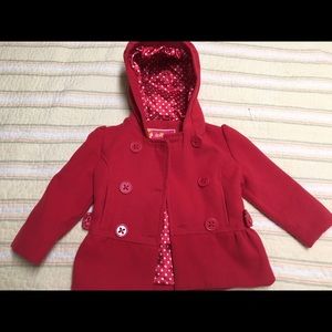 Red winter toddler girl's coat.