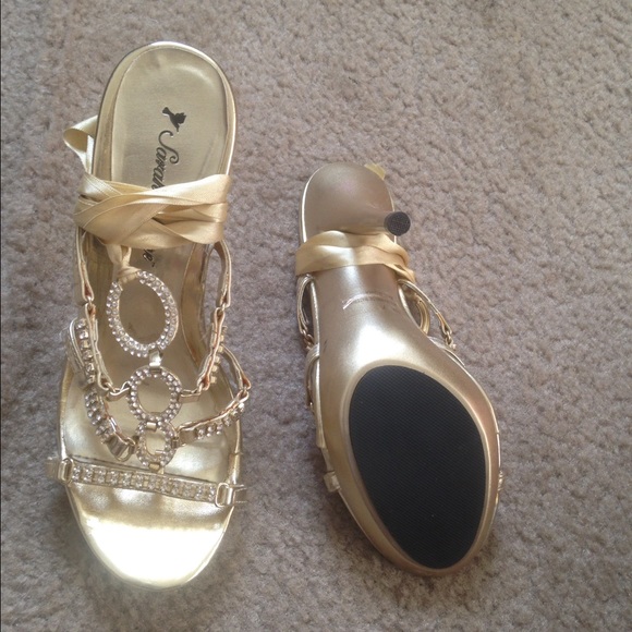 Gold tie up heels. Brand new condition worn once.