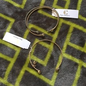 Three gold and silver bracelets