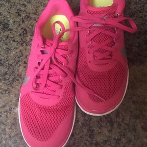 Pink nike free sneakers