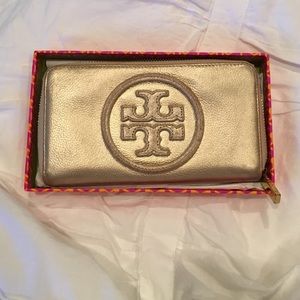Gold Tory Burch zip wallet
