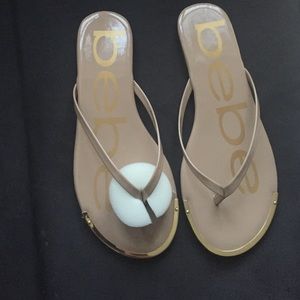 Beige bebe sandals.