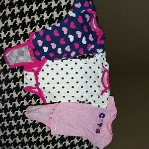3 onesies - only the pink  patterned one was worn