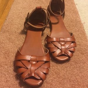 Brown mossimo sandals.