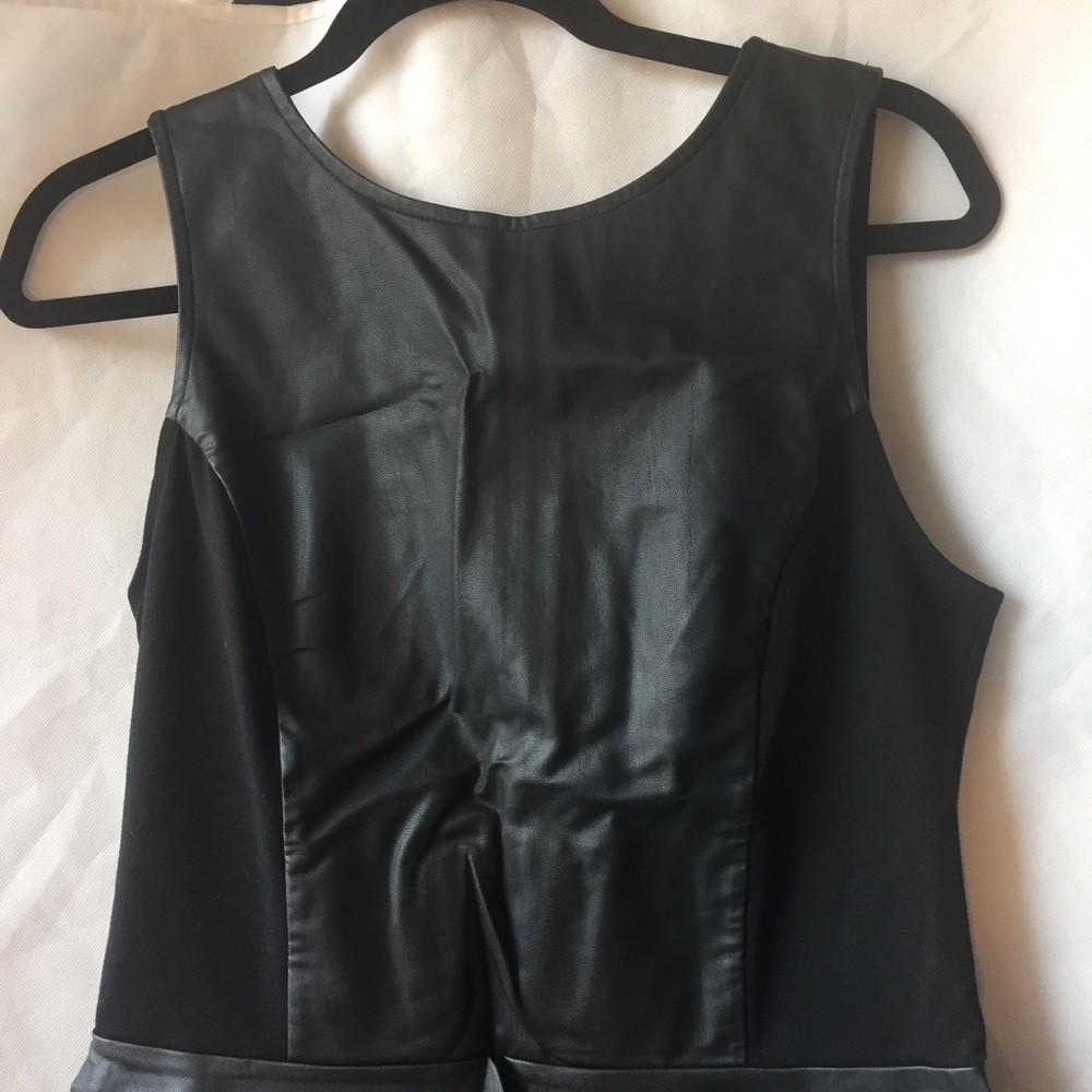SOLD. Leather peplum top