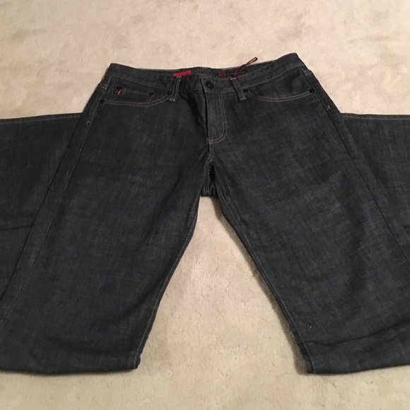 AG boot cut jeans. Never worn. 31R.