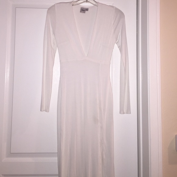 Sexy Sleek white dress with plunge neck and slit