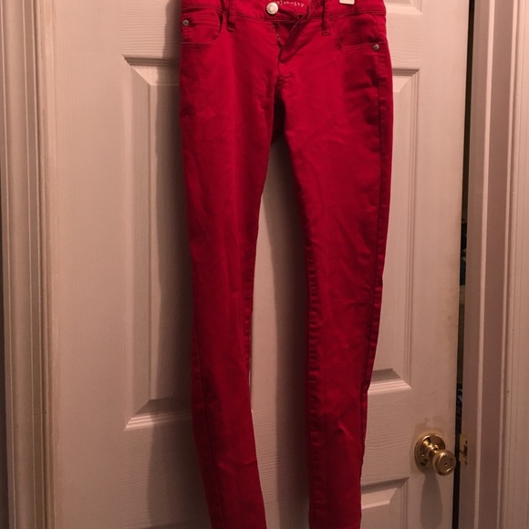 Bright red stretch jeans