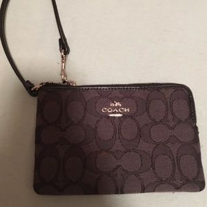 Black and grey coach wristlet