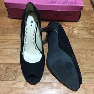 Never worn Peep toe suede heels