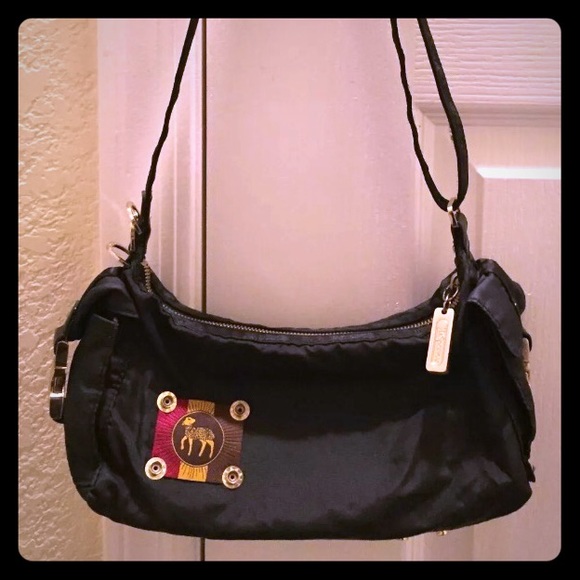 L.A.M.B by LesportSac Rasta Ribbon Cargo Handbag.