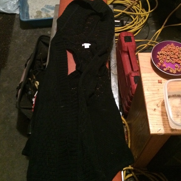 Sweater vest fairly new