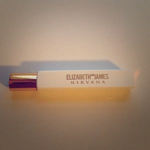 Elizabeth and James Nirvana roll on perfume.