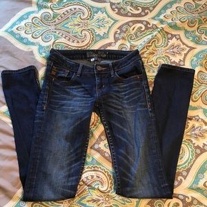 Size 25 Miss Me jeans.