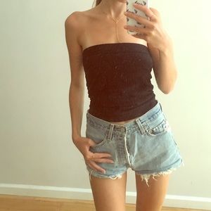 Vintage distressed blue Levi cutoff jean shorts 25