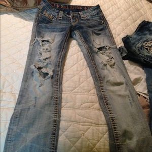 Truly distressed Rock Revival jeans