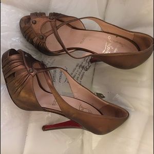 Christian louboutin dark gold heels