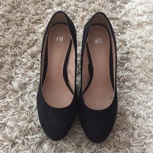Black suede pumps