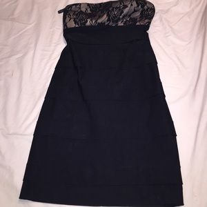 Black dress with beige fabric and lace