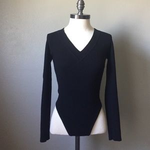 Long sleeved body suit