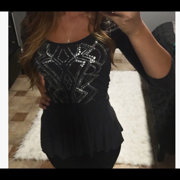 Eyeshadow sequin peplum top