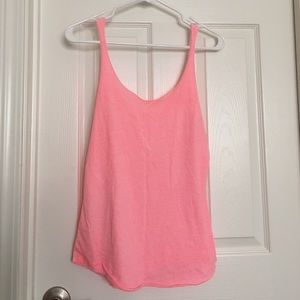 Neon pink tank top from Urban Outfitters