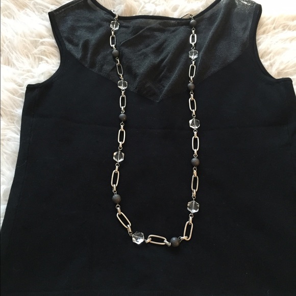 Black sleeveless sweater