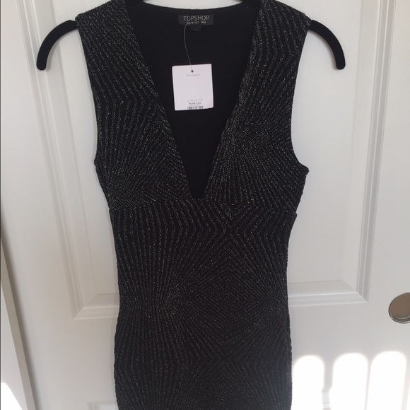 Never worn black dress with silver accents - Picture 1 of 3