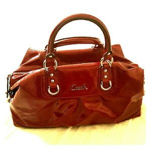 Coach red leather handbag.