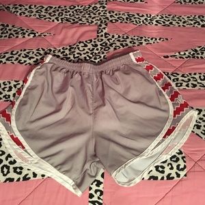 Varsity shorts with red and white chevron strips