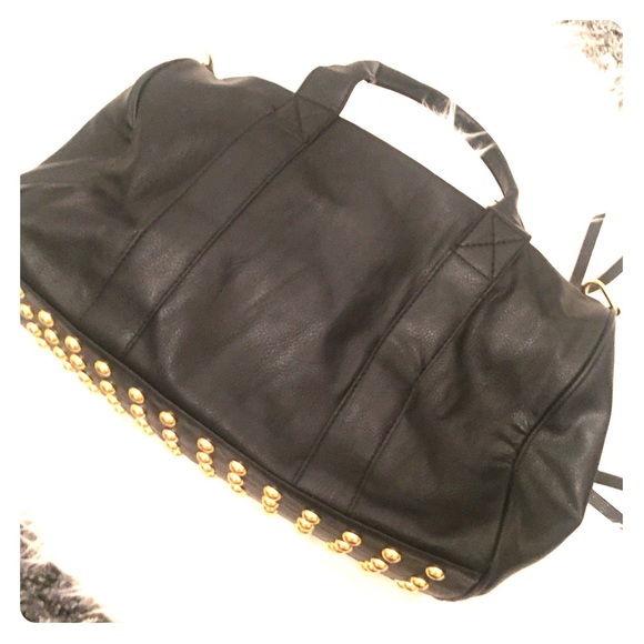 Large black tote with gold studded bottom