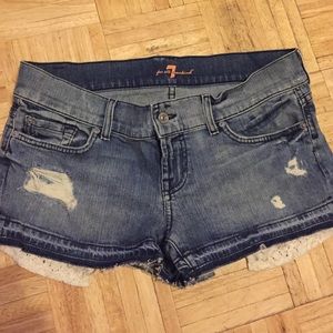 Cutoff denim shorts with white lace