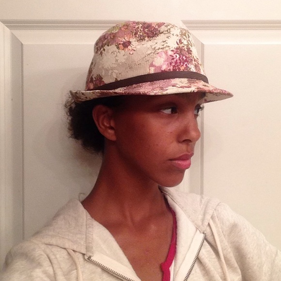 Floral fedora with brown band. 100% cotton.