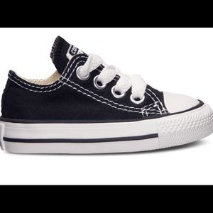 Black Low Top Converse Chucks....