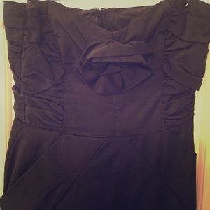 Black strapless dress.