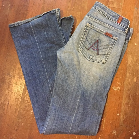 A pocket 7 for all mankind medium wash jeans