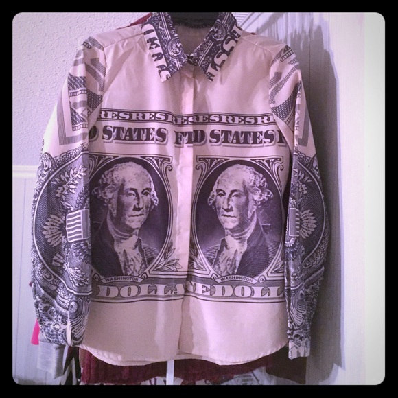 US dollar shirt.
