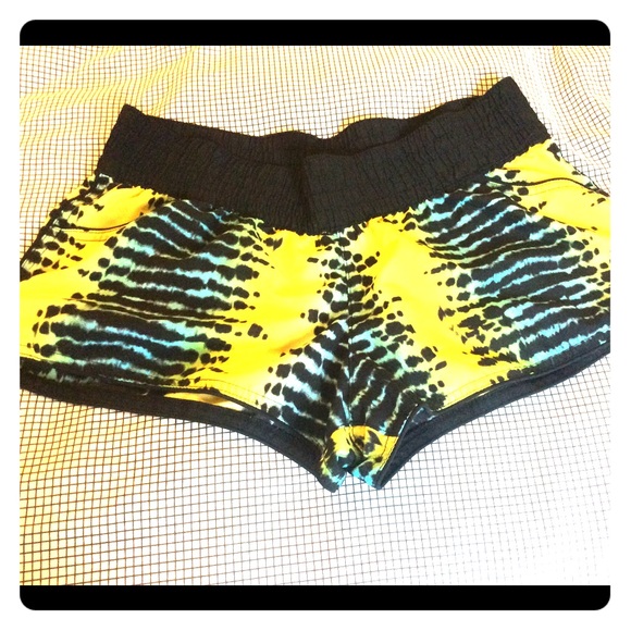 Neon tropical board shorts
