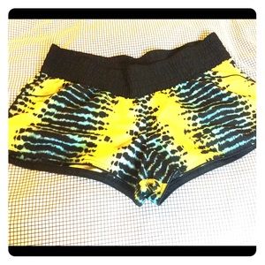 Neon tropical board shorts