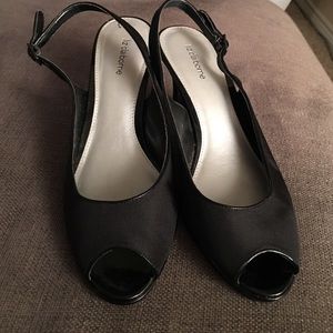 Black fabric peep toe sling back.