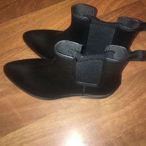Black rain boots