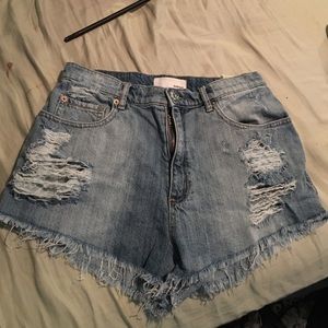 Distressed denim shorts