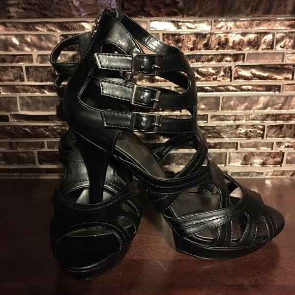 Black strapped high heels.