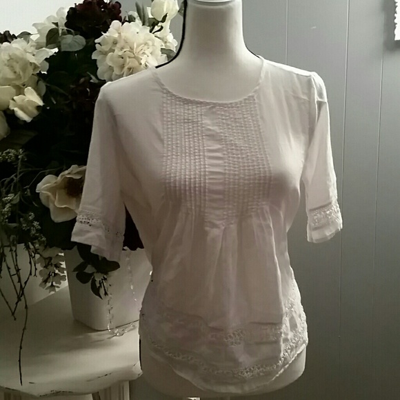 White blouse with crocheted lace trim