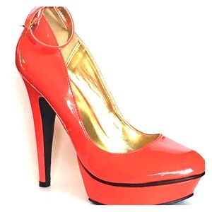 Red ankle strap almond toe platform stiletto