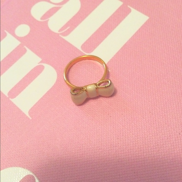 Kate Spade white and gold bow ring